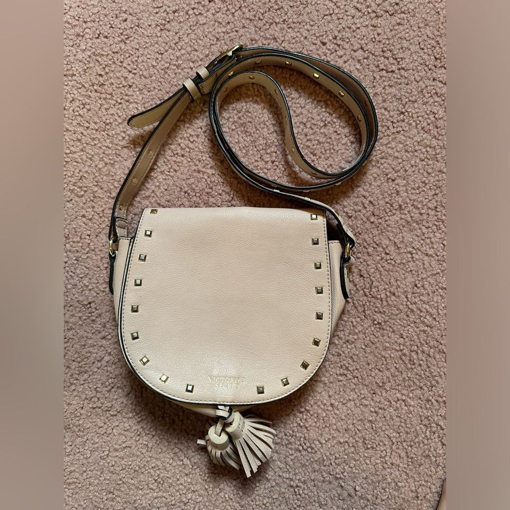 EUC Victoria’s Secret small saddle bag with tassles and gold studs